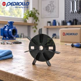 Black fan impeller for electric pump with 12 mm shaft on workshop bench