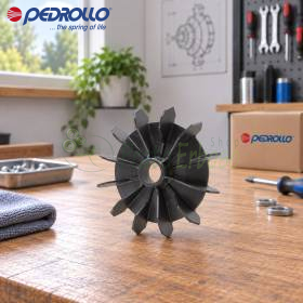 Ventilateur FAN-100R noir pour pompe électrique, axe 28 mm, posé sur établi d’atelier