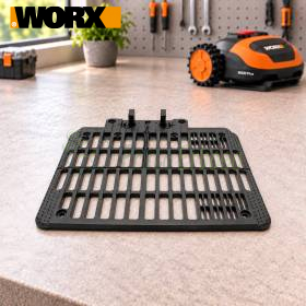 Plaque de taille M noire pour robot tondeuse WORX Landroid sur établi d’atelier